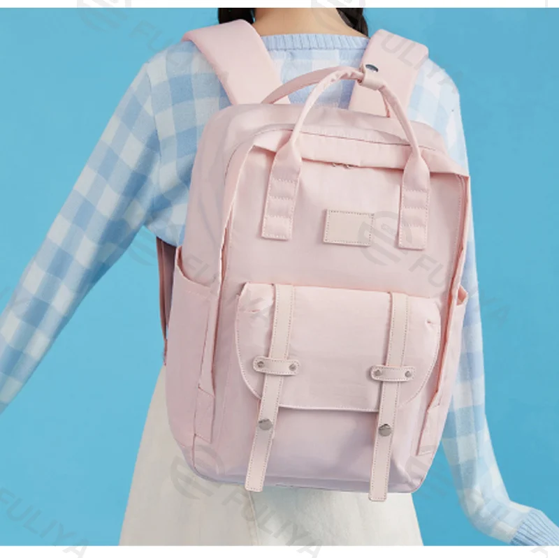 Guangzhou Fuliya Industry Co.,Ltd C-81462 This backpack is water-repellent, lightweight (0.63kg), fits a 15-inch laptop, with multiple compartments, and can be carried as a handbag, shoulder bag, or backpack - ideal for commuting and school.