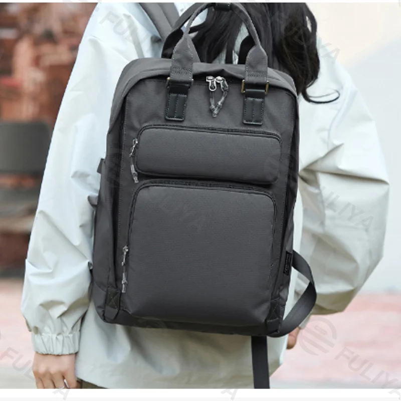 Guangzhou Fuliya Industry Co.,Ltd C-81464 This versatile backpack fits a laptop, is water-repellent and stain-resistant, includes a detachable insulated bottle pouch, and has a trolley strap - suitable for business, commuting, and family outings.
