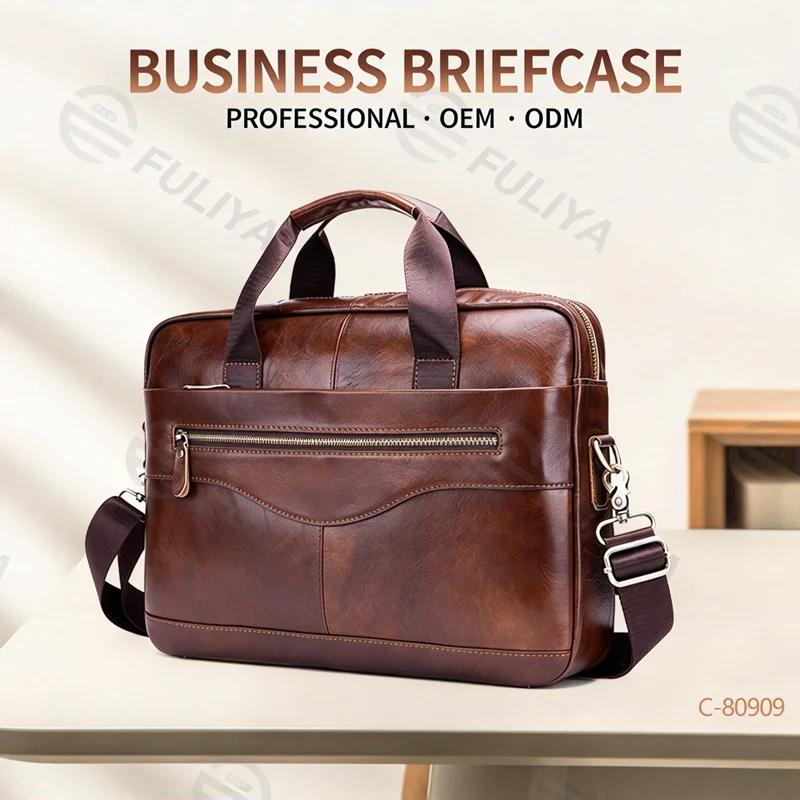 Guangzhou Fuliya Industry Co.,Ltd C-80909 Men's top-grain cowhide laptop briefcase, large capacity, laptop compartment, alloy zipper, and adjustable strap - hand, shoulder, or crossbody carry for business, commuting, and business trips.