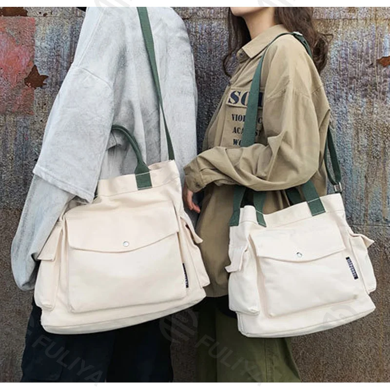 Guangzhou Fuliya Industry Co.,Ltd C-80911 Canvas tote bag, water-resistant, multiple colors, customizable, large capacity, flap pocket, side pockets, handle, and adjustable strap - for commuting, campus, and daily use.