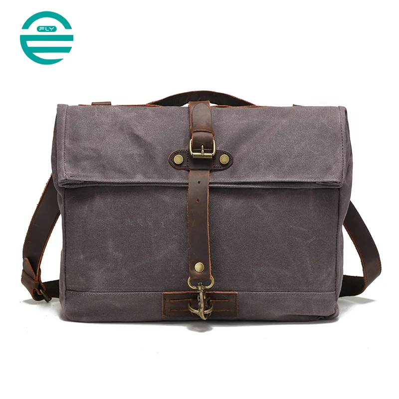 Guangzhou Fuliya Industry Co.,Ltd C-80924  New water-repellent oil-wax canvas crossbody bag, vintage crazy horse leather accents, multi-compartment storage, fits 15.6" laptop, widened cowhide shoulder pad - for commuting and daily use.