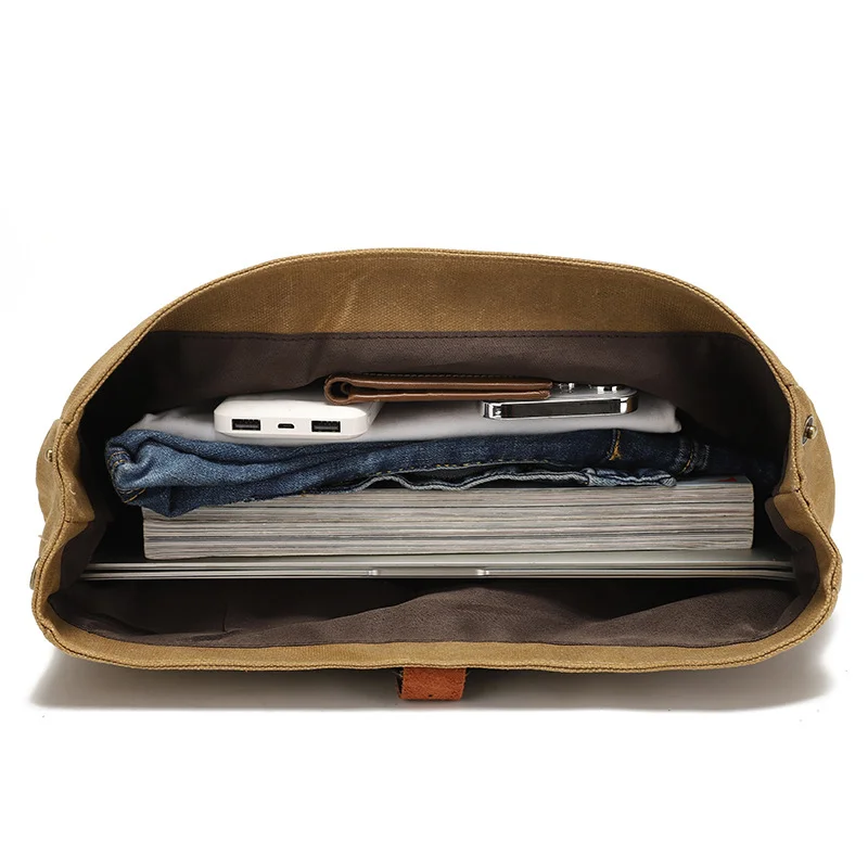 Guangzhou Fuliya Industry Co.,Ltd C-80924  New water-repellent oil-wax canvas crossbody bag, vintage crazy horse leather accents, multi-compartment storage, fits 15.6" laptop, widened cowhide shoulder pad - for commuting and daily use.