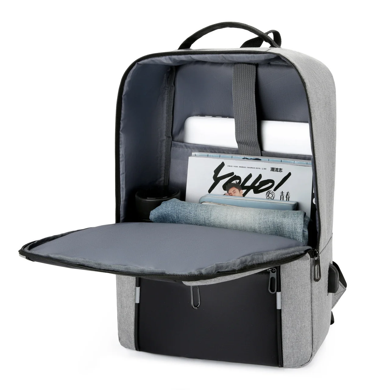 Guangzhou Fuliya Industry Co.,Ltd C-80938 Stylish spliced backpack with a convenient charging port. Features a laptop compartment, multi-zipper pockets, and large-capacity storage. Suitable for business, commuting, students, and travel.