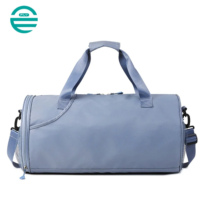 Guangzhou Fuliya Industry Co.,Ltd C-80939 Dry-wet travel duffel with shoe compartment, front zip pocket, and trolley belt. Waterproof, large capacity. For gym, sports, and weekend trips.