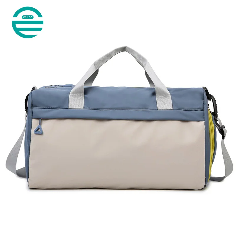 Guangzhou Fuliya Industry Co.,Ltd C-80940 Pink waterproof training travel bag with shoe compartment, front zip pocket, and trolley belt. Dry-wet separation, large capacity. For women's fitness, sports, and travel.