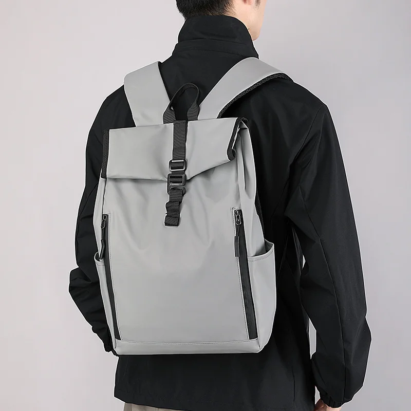 Guangzhou Fuliya Industry Co.,Ltd C-80944 Men's roll-top backpack with multi-layer large capacity (fits 3-5 days of clothes). Features breathable shoulder straps and a trolley sleeve for easy carry. For business trips, short travel, and commuting.