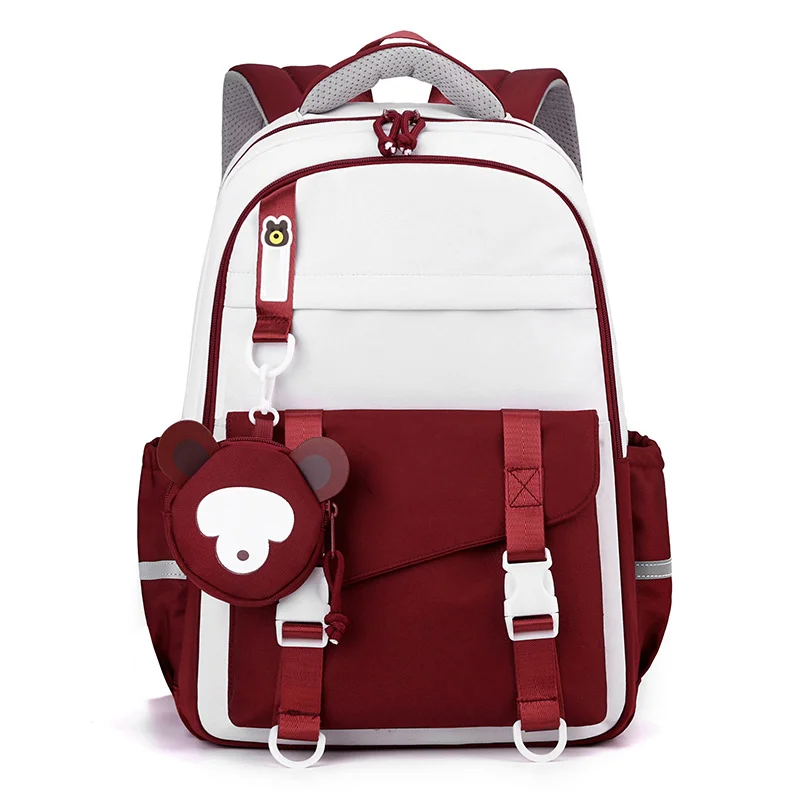 Guangzhou Fuliya Industry Co.,Ltd C-80951 Large-capacity water-resistant school backpack with multi-pockets, reflective strips, and trolley sleeve. Includes a cute charm. For junior high, high school, and college students.