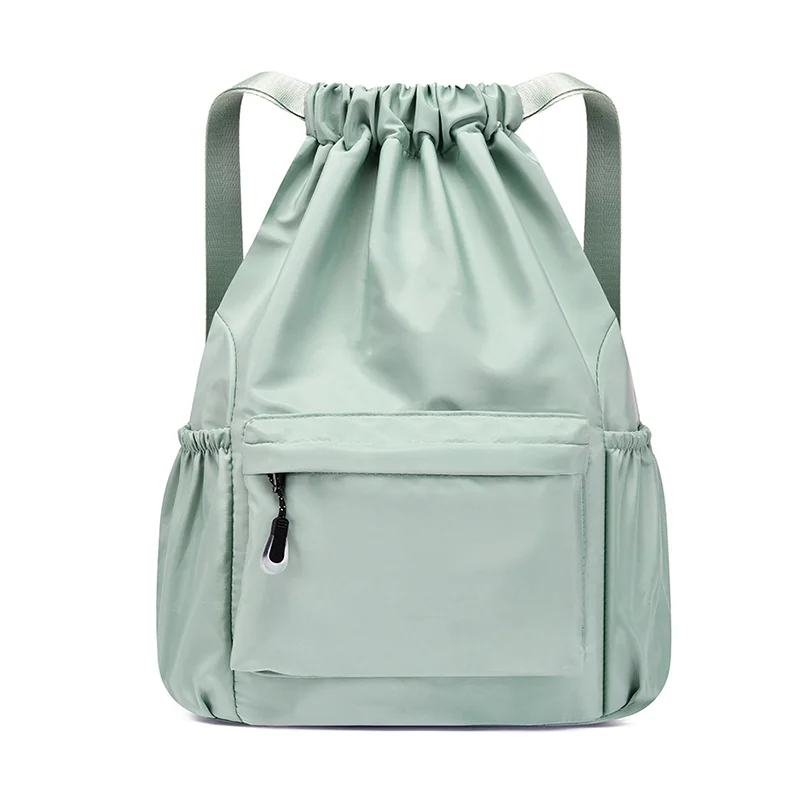 Guangzhou Fuliya Industry Co.,Ltd C-80956 Water-resistant drawstring backpack with durable water-repellent fabric and a wet/dry separation bag. Drawstring closure and adjustable straps. Lightweight and sturdy. For sports, travel, and daily use.