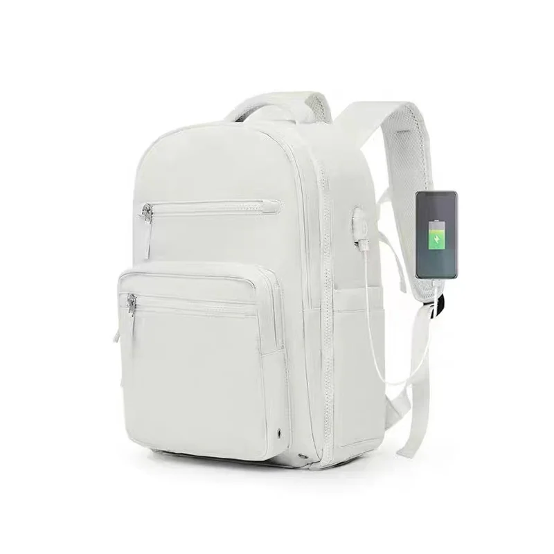 Guangzhou Fuliya Industry Co.,Ltd C-80987 Minimalist travel backpack with 180° clamshell opening and wet/dry separation. Features internal mesh pockets and external USB port. Large capacity for short trips, school, and commuting.
