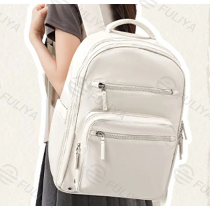 Guangzhou Fuliya Industry Co.,Ltd C-80987 Minimalist travel backpack with 180° clamshell opening and wet/dry separation. Features internal mesh pockets and external USB port. Large capacity for short trips, school, and commuting.
