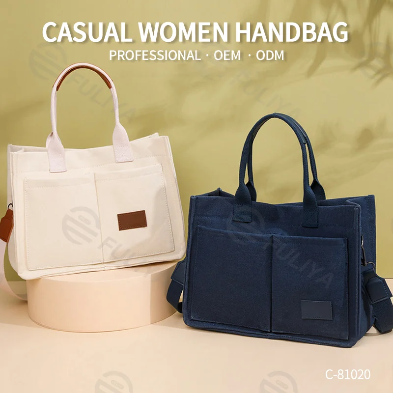 Guangzhou Fuliya Industry Co.,Ltd C-81020 Women's canvas tote bag, water-resistant, large capacity, fits 15.3" laptop, bottle, umbrella, and books, multi-layer pockets, comfortable handle, and detachable strap - for commuting, work, and travel.