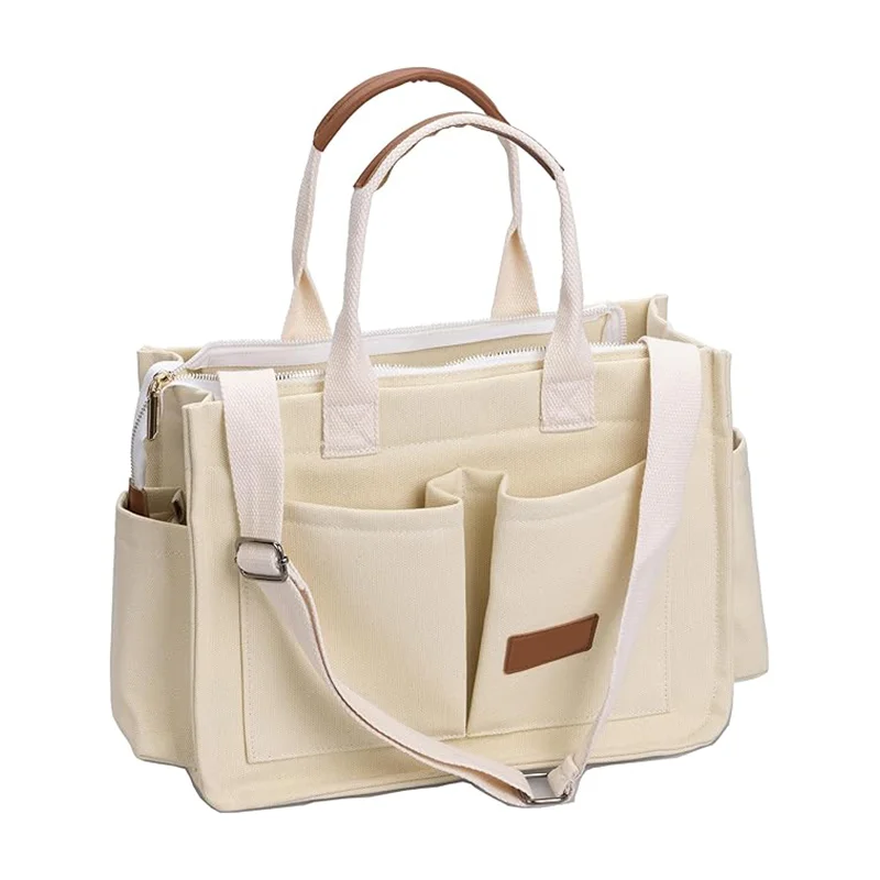 Guangzhou Fuliya Industry Co.,Ltd C-81020 Women's canvas tote bag, water-resistant, large capacity, fits 15.3" laptop, bottle, umbrella, and books, multi-layer pockets, comfortable handle, and detachable strap - for commuting, work, and travel.