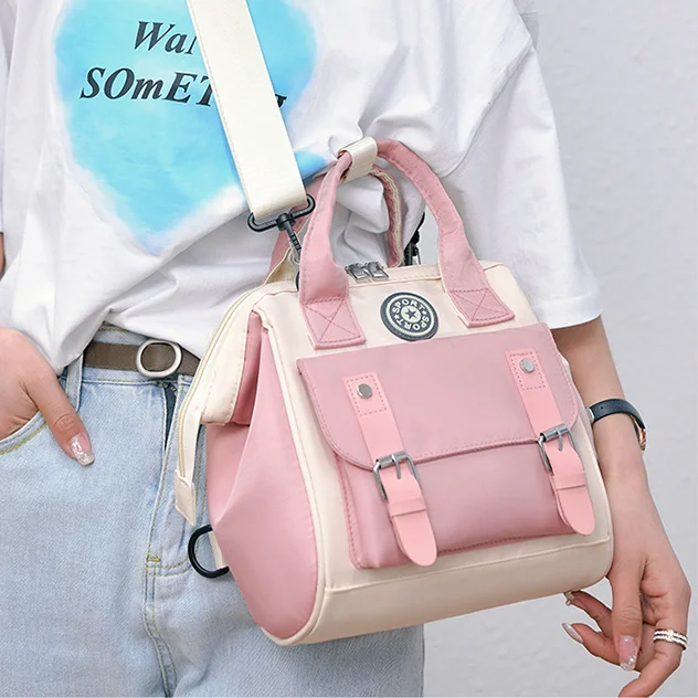 Guangzhou Fuliya Industry Co.,Ltd C-81028 Waterproof diaper bag, large capacity with multi-layer storage, separate bottle compartments, double zipper, detachable strap, and stroller straps - hand, shoulder, or backpack carry for baby outings and travel.