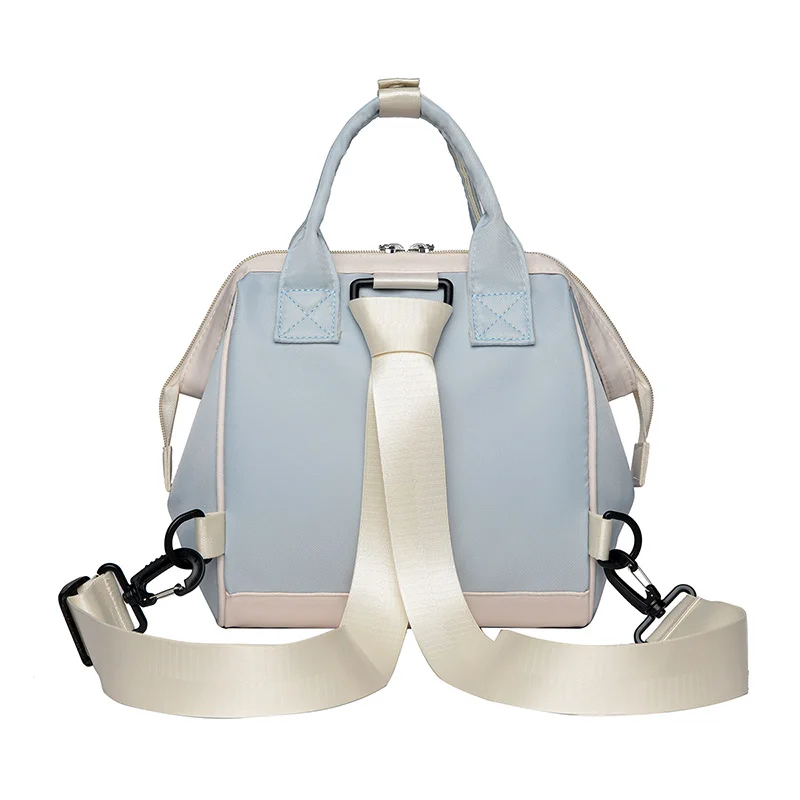 Guangzhou Fuliya Industry Co.,Ltd C-81028 Waterproof diaper bag, large capacity with multi-layer storage, separate bottle compartments, double zipper, detachable strap, and stroller straps - hand, shoulder, or backpack carry for baby outings and travel.