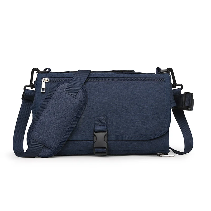 Guangzhou Fuliya Industry Co.,Ltd C-81029 Portable baby changing pad bag, multi-functional foldable design, changing mat, storage pockets, tissue dispenser, zipper pocket, and handle - attaches to stroller or car for easy travel.