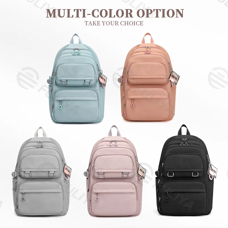 Guangzhou Fuliya Industry Co.,Ltd C-81050 Student load-reducing backpack, lightweight nylon, large capacity, front/side pockets, adjustable strap, spine-protecting back pad, and luggage strap - for primary and middle school students.