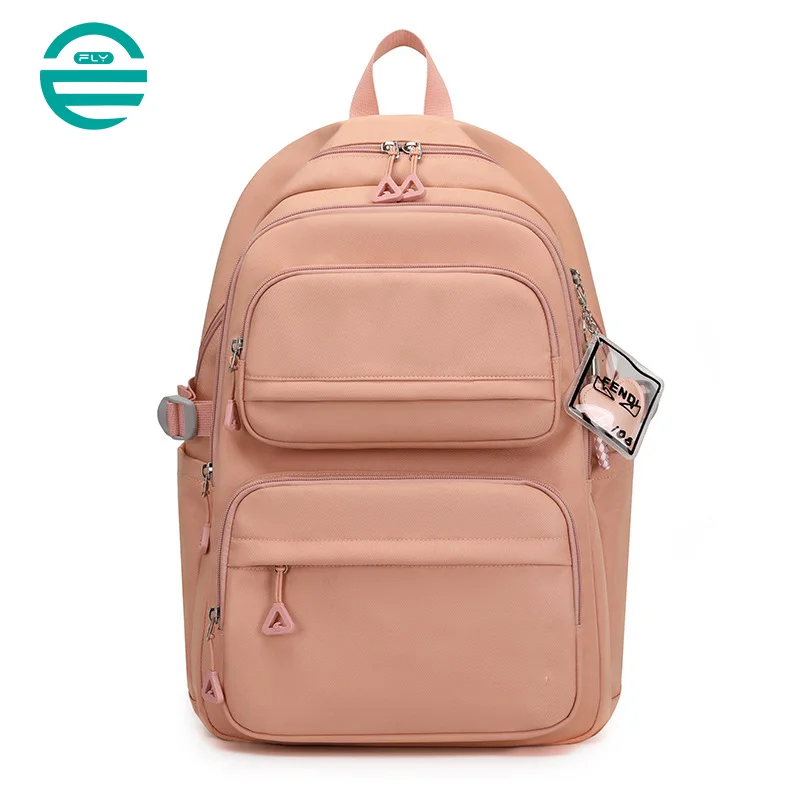 Guangzhou Fuliya Industry Co.,Ltd C-81050 Student load-reducing backpack, lightweight nylon, large capacity, front/side pockets, adjustable strap, spine-protecting back pad, and luggage strap - for primary and middle school students.