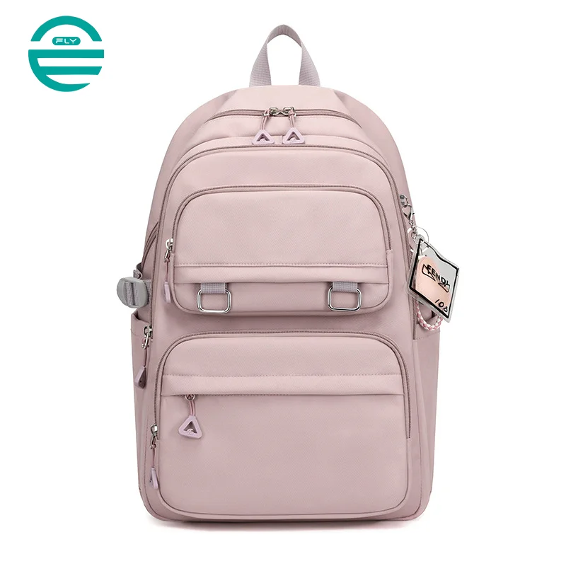 Guangzhou Fuliya Industry Co.,Ltd C-81050 Student load-reducing backpack, lightweight nylon, large capacity, front/side pockets, adjustable strap, spine-protecting back pad, and luggage strap - for primary and middle school students.
