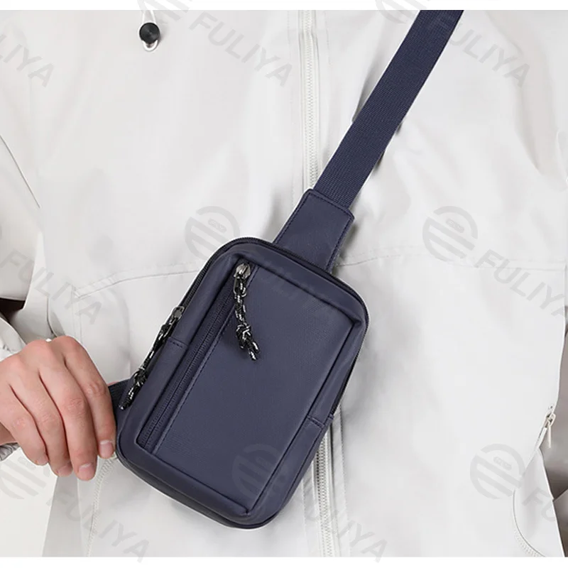 Guangzhou Fuliya Industry Co.,Ltd C-81079 Men's mini chest bag, water-repellent, lightweight and slim, wide-opening main compartment with inner and front pockets for phone and small items - crossbody or chest carry for commuting and daily use.
