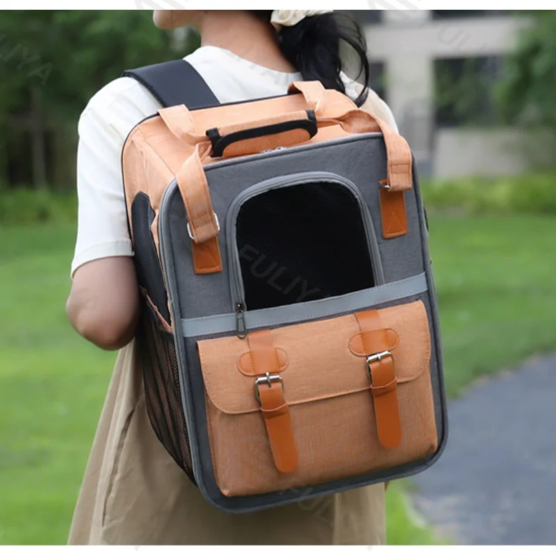 Guangzhou Fuliya Industry Co.,Ltd C-81084  Pet travel backpack, water-repellent canvas, wide opening, multi-side ventilation, escape-proof buckle, front pocket, reinforced stress points, and anti-slip base pad - for cats, small/medium dogs, and rabbits.